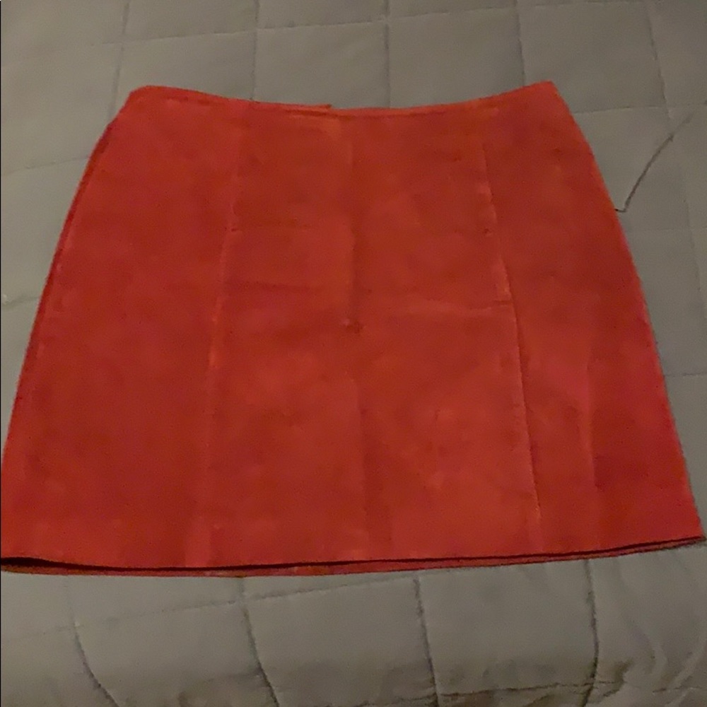 Red suede mini skirt